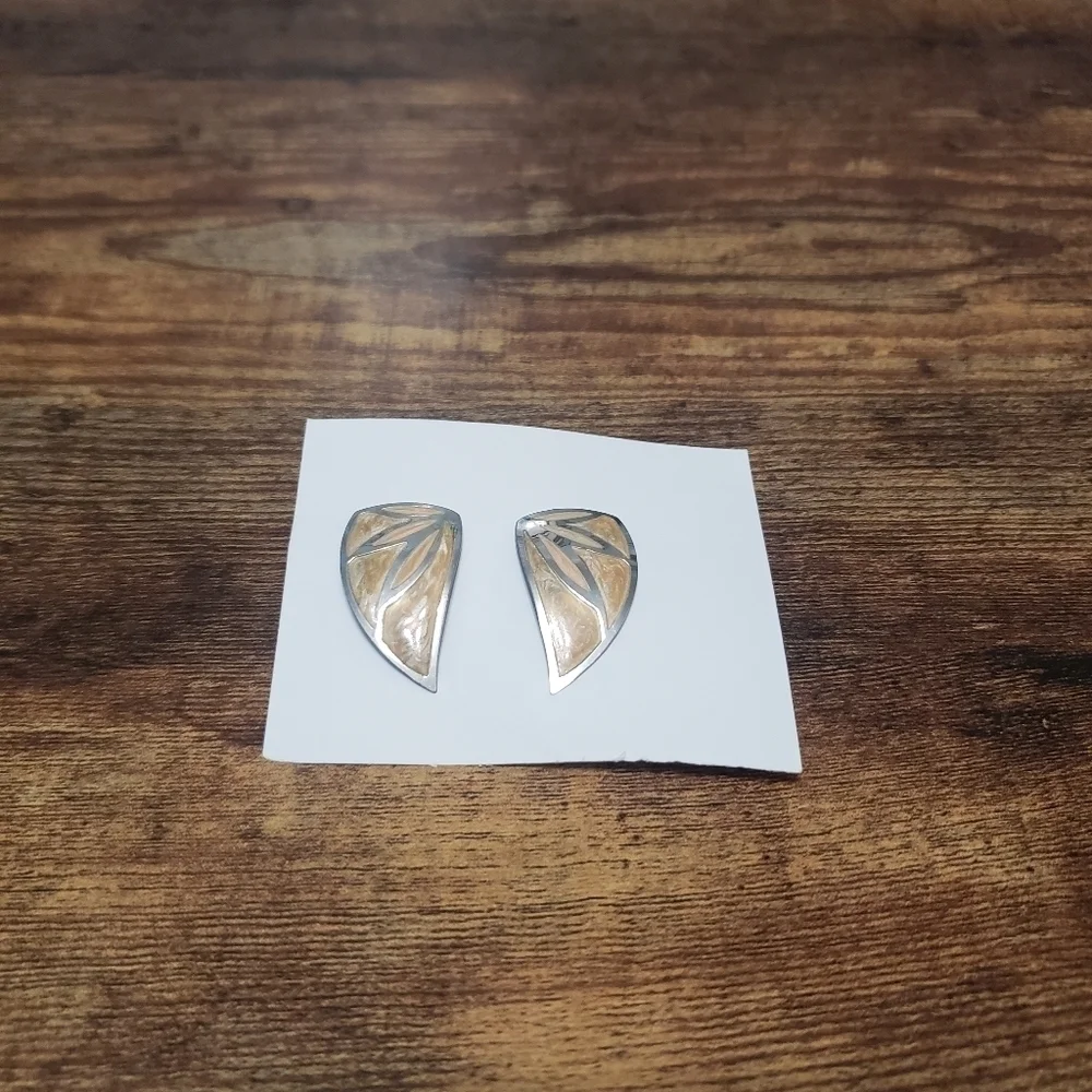 silver tone statement earrings